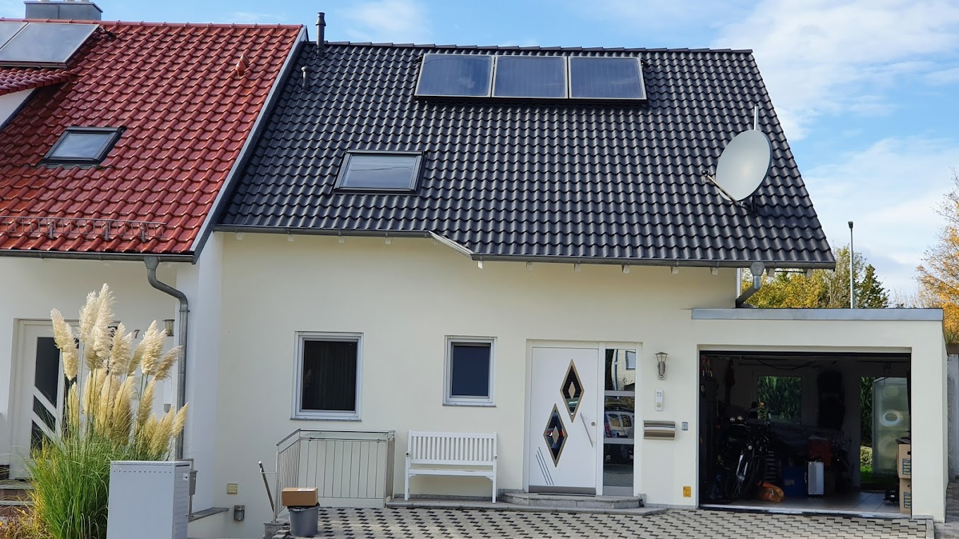 Professionelle Dachbeschichtung eines Einfamielienhauses in Mannheim - Dachprofi Weiss nach der Arbeit.